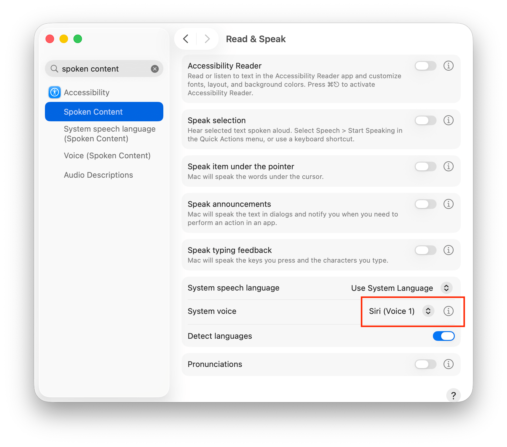 System Settings showing Spoken Content with the System voice selector